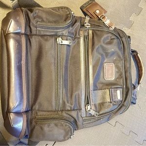 Tumi travel backback dark brown
